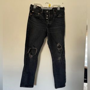 Women’s distressed Levi jeans